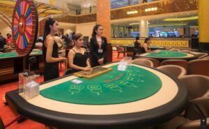 Players enjoying a poker game at Kasino Kamboja
